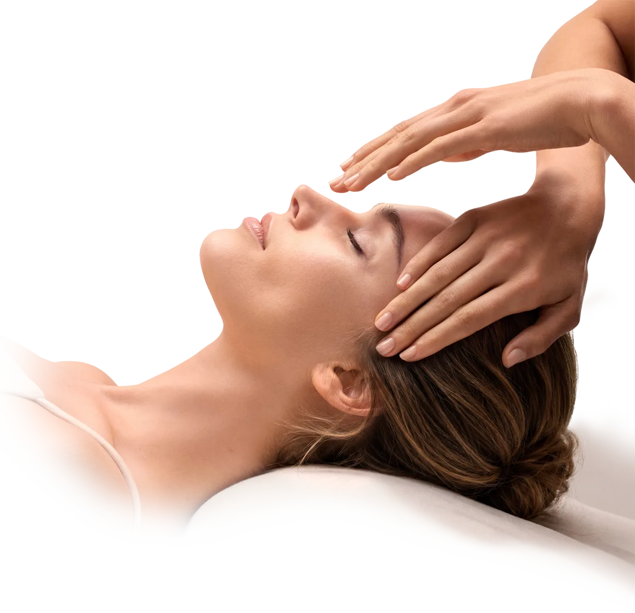 Hands performing a face massage